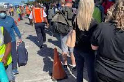 Tourists arrival at the Phillip Goldson Airport