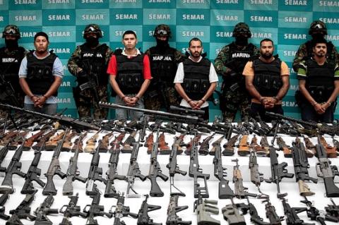 FILE: Captured Mexican Cartel operatives in possession of American made Weapons