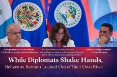 While Diplomats Shake Hands, Headline Image